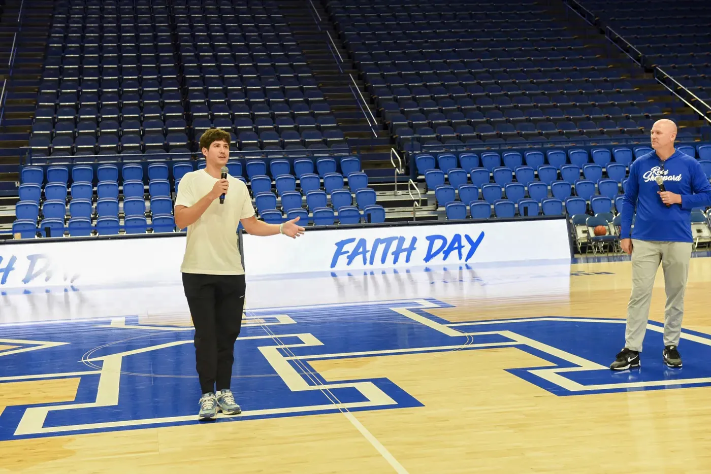 Sharing a faith message on the basketball court at Faith Day